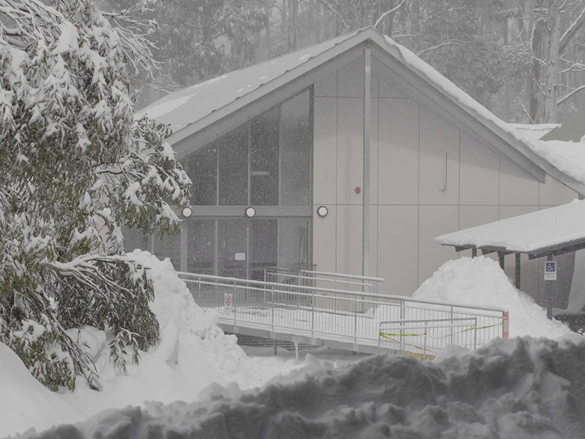 An exterior image of the All Access Abilities Building at Howmans Gap Alpine Centre during winter.