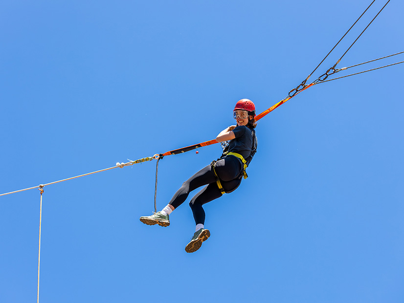 Person on high ropes course