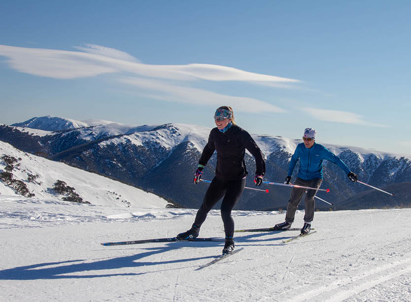 Skate skiiing with Mt Bogong in the background  at Fall Creek Cross Country   